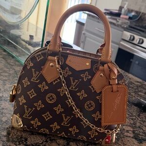 Limited Edition Louis Vuitton Brown Alma Mini Bag